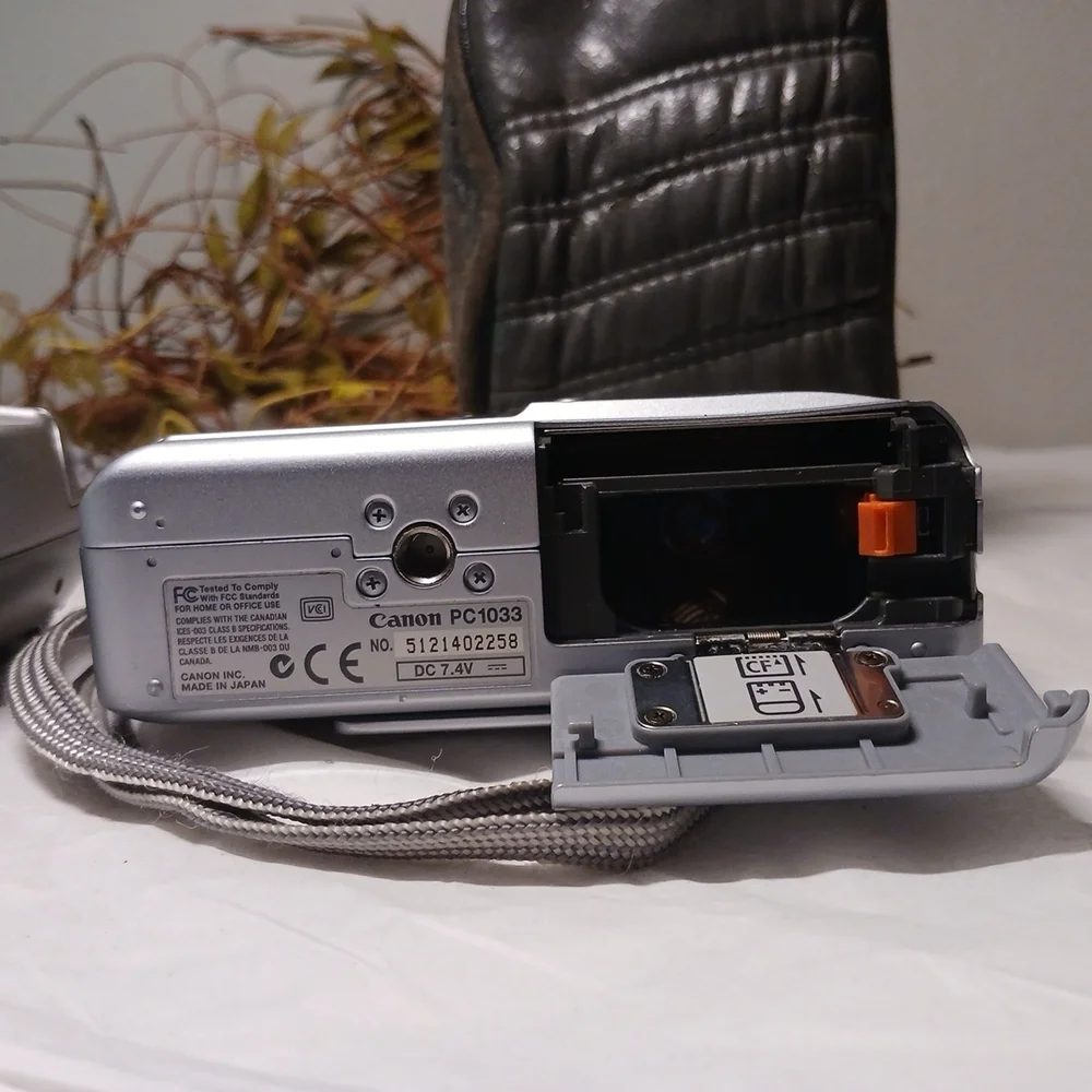 Olympus Silver Camedia D-550 Compact Digital Camera And Canon With Beat Up Case